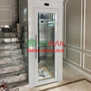 Mẫu thang máy cửa mở tay